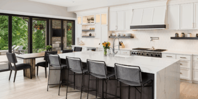 Elegant kitchen with sanitized surfaces after premium house cleaning service.